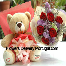 Bunch Of 7 Red Roses And A Medium Sized Cute Teddy Bear Delivered in Portugal