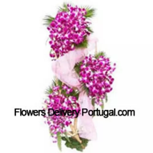 A 4 Feet Standing Arrangement Of Orchids