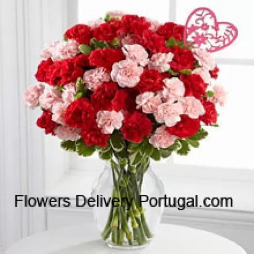 37 Carnations ( 19 Red And 18 Pink ) With Seasonal Fillers And Valentine Heart Stick In A Glass Vase
